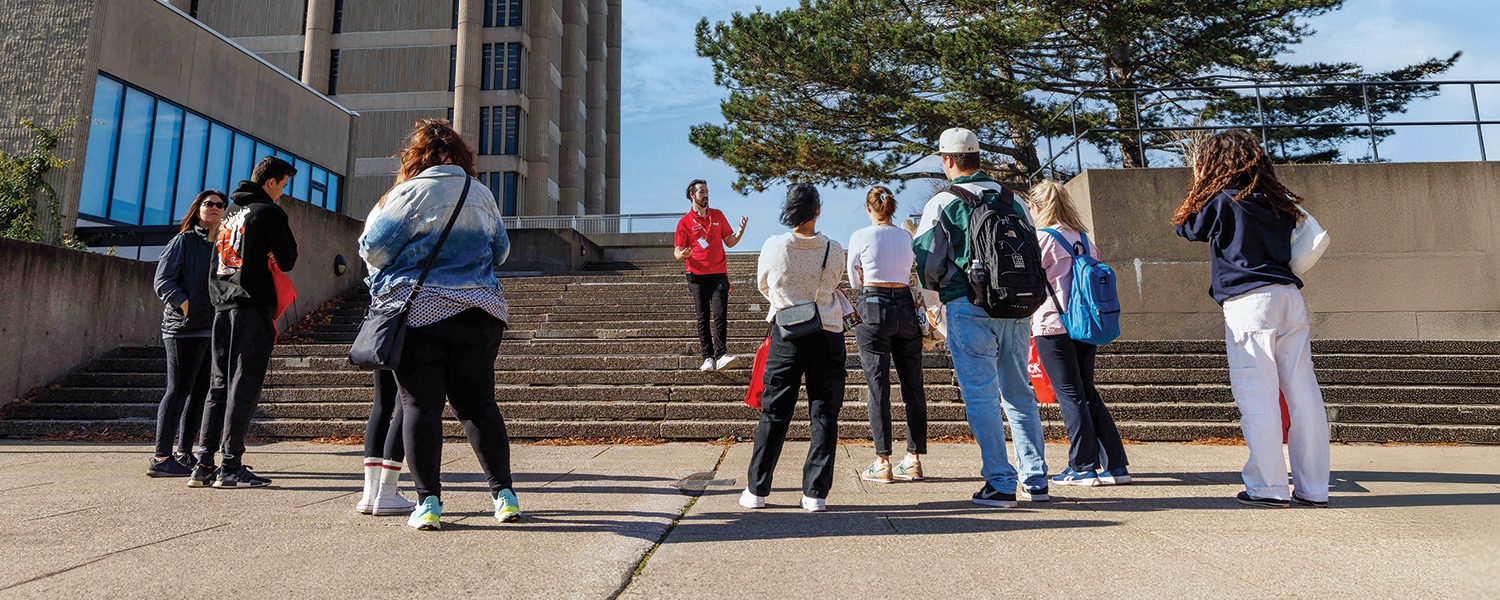 Prospective students and their families participating in a campus tour at Brock